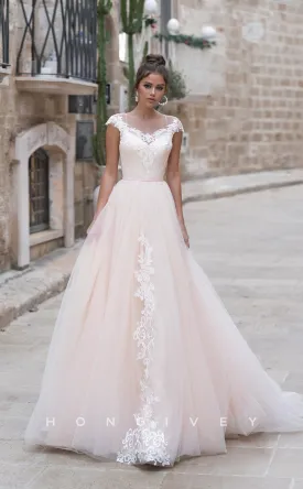 H0823 - Lace-Up Crisscross Floral Embroidered Lace Sheer With Tulle Train Wedding Dress